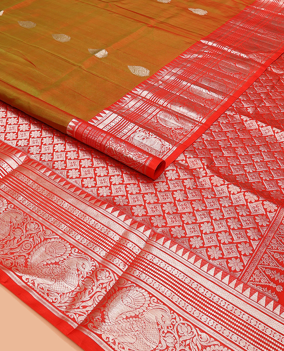 Green buttas Venkatagiri silk saree, contrast temple traditional border of peacocks, and intricate pallu