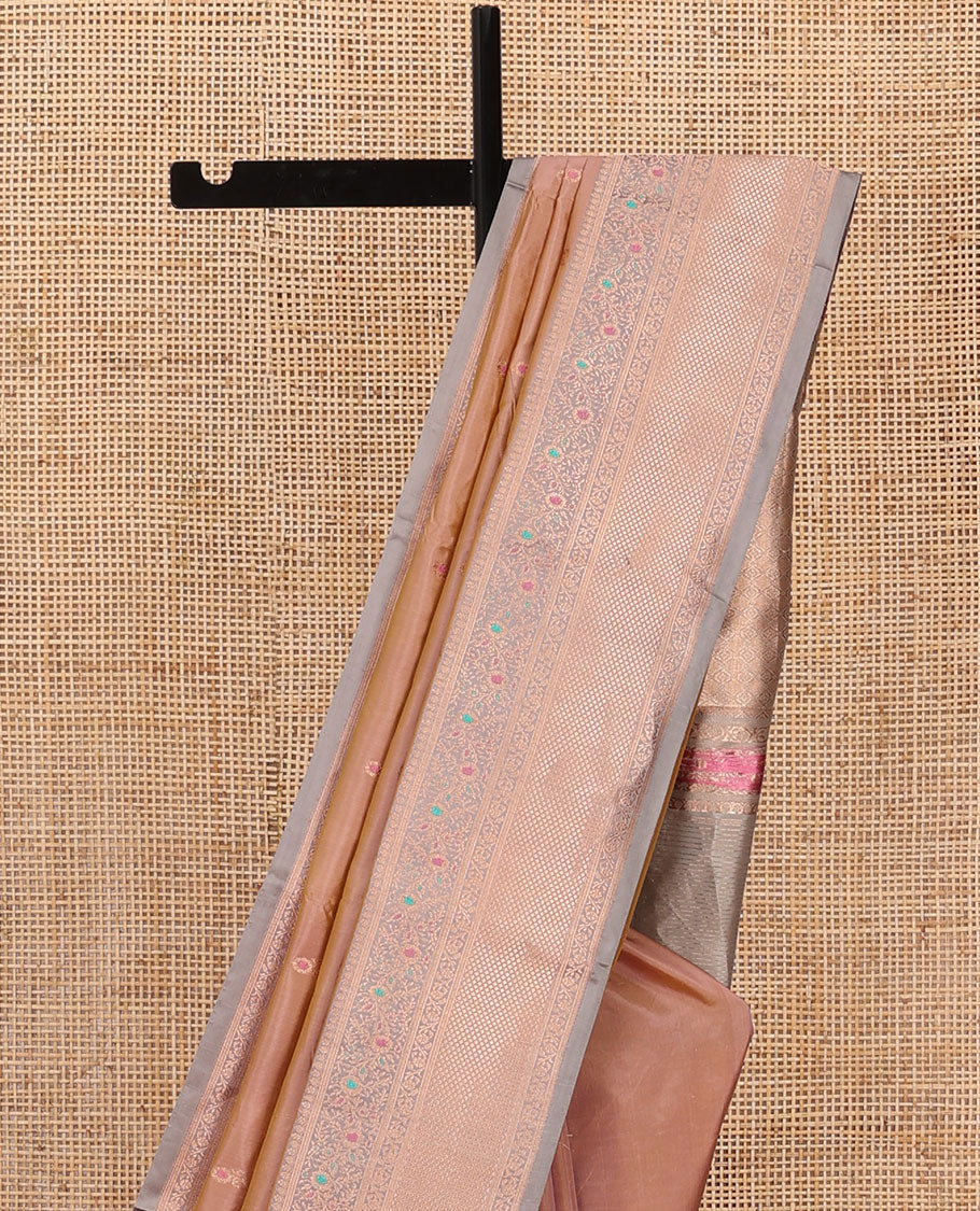 Pinkish peach dual tone zari buttas katan silk saree, contrast traditional zari border of floral meenakari motifs, and jaal pallu