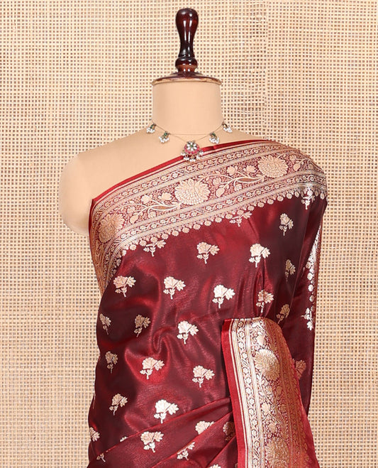 Maroon Banarasi Nylon Saree, Embellished with Zari Buttas, Highlighted by a Floral Creeper Zari Border, Intricate Pallu, and a Matching Blouse