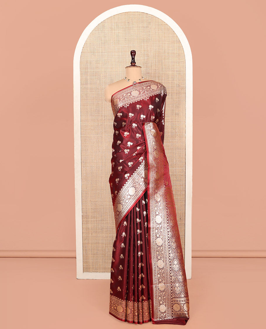 Maroon Banarasi Nylon Saree, Embellished with Zari Buttas, Highlighted by a Floral Creeper Zari Border, Intricate Pallu, and a Matching Blouse