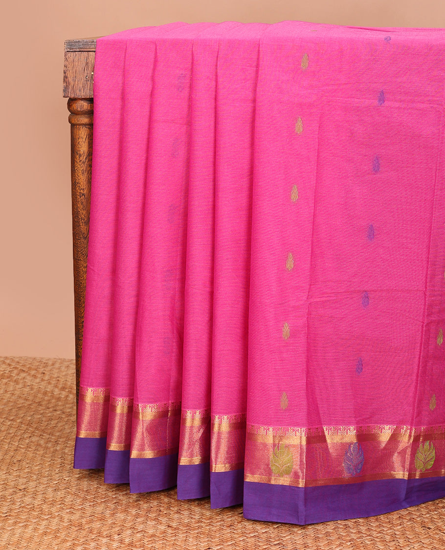 Pink buttas kanchi cotton saree, contrast zari and thread border, and pallu of floral creeper, and paisley designs