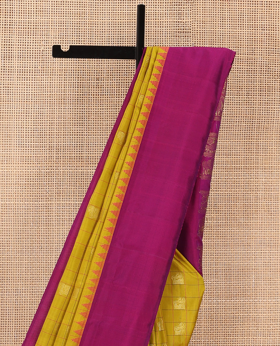 Green buttas enclosed checked gadwal silk saree, contrast thazampoo rekku plain border, and pallu of mayil, and kuthirai designs