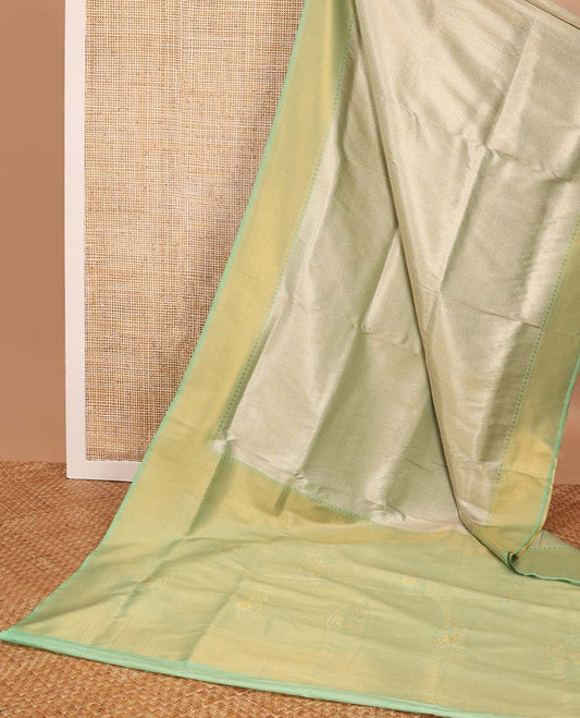 Mint green  jacquard softy saree with contrast zari design border & floral design pallu