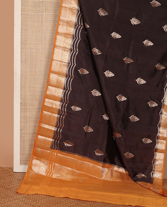 Brown floral meena buttas raw mango silk saree, contrast floral design border creeper, and floral design pallu