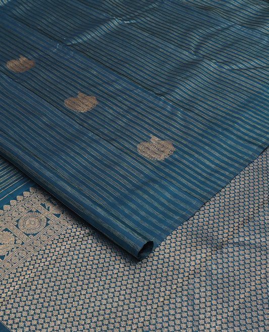 Blue striped and mayil buttas Kanchipuram silk saree, self-border, and pallu of thilakam mokku, muthu, poun, mayil chakram, and jaal