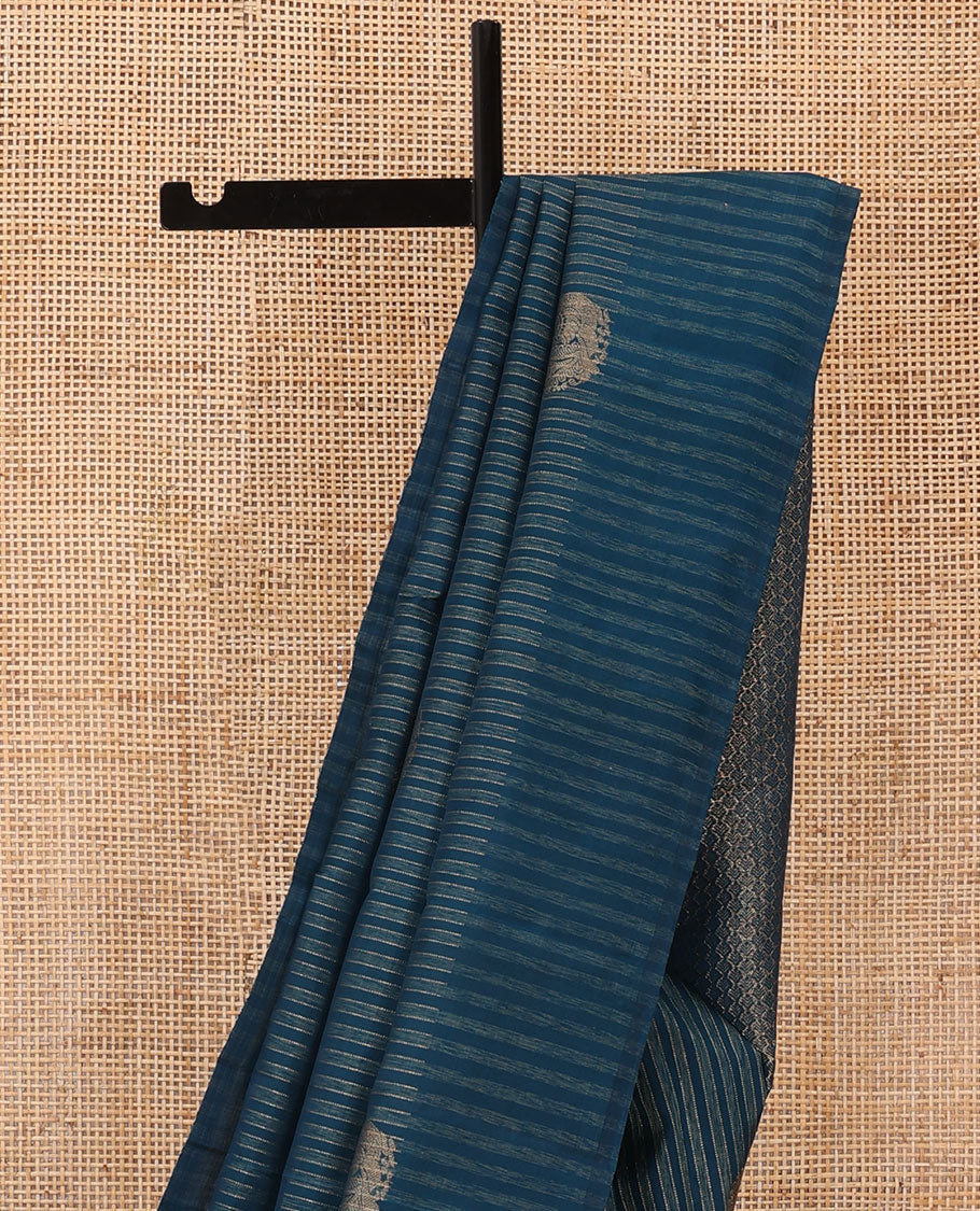 Blue striped and mayil buttas Kanchipuram silk saree, self-border, and pallu of thilakam mokku, muthu, poun, mayil chakram, and jaal