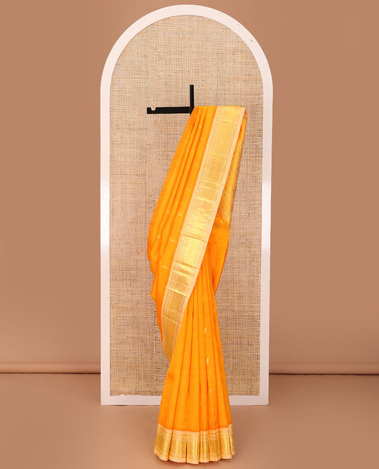 Orange zari buttas Kanchipuram silk saree, contrast one-sided border of panner sombu,banaras & jaal, & floral design pallu