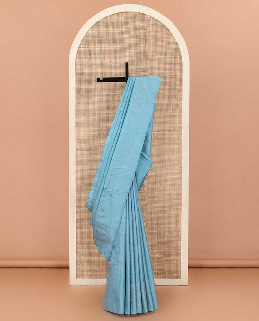 Blue striped soft silk saree, floral jaal border, and pallu of jaal design