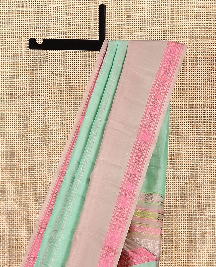 Green zari design soft silk saree, contrast rettai pettu border of rudraksham, and chakram designs, and jaal pallu