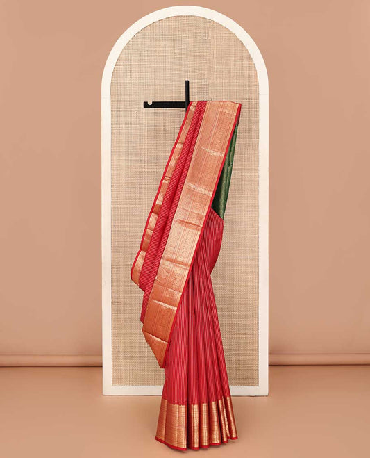 Red muthu striped silk saree, zari border of thilakam,ara bogudi, diamond, rettai neli, jaal and kodi visiry, and contrast jaal pallu