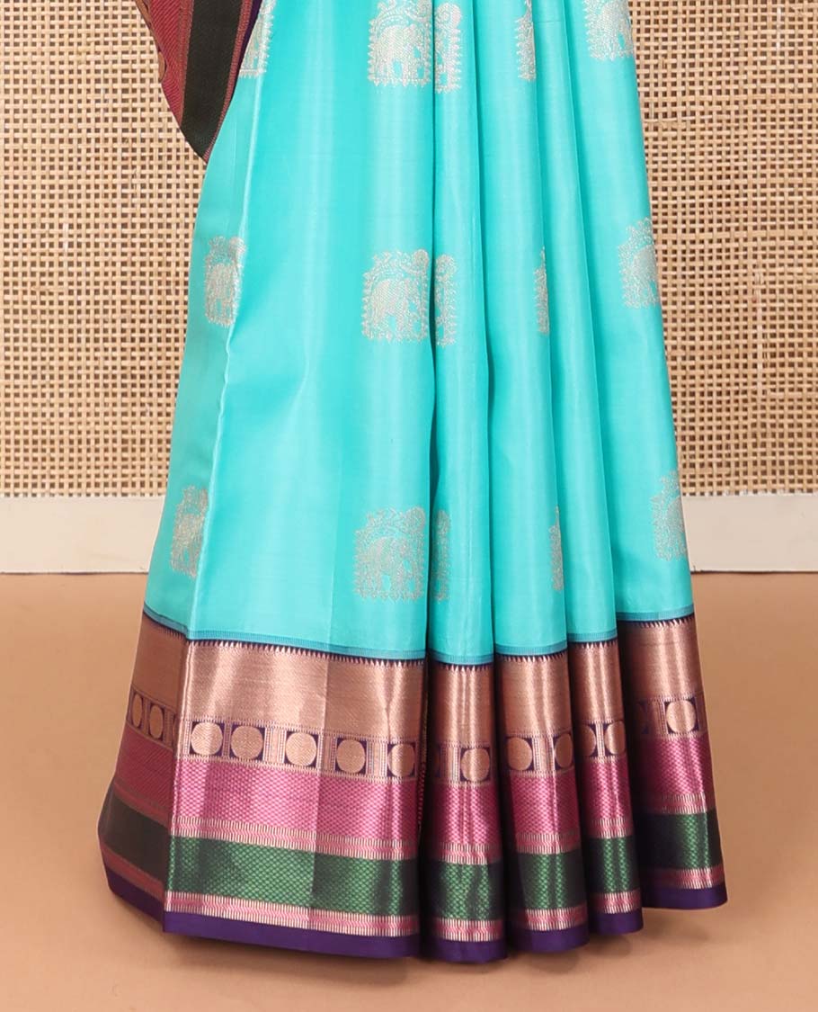 Blue yaanai buttas silk saree, contrast border of rekku, muthu, banaras, mayil kann, and rudraksham motifs, and jaal pallu