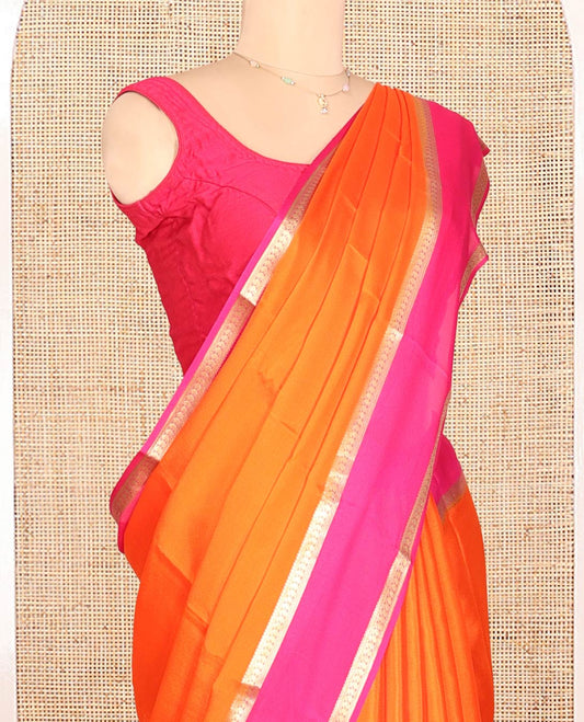 Orange Plain Mysore Silk Saree, a Contrast Traditional Zari Double-Pet Border, Zari Striped Pallu, and a Contrast Blouse