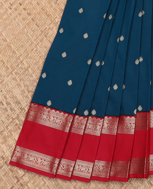 Blue zari buttas budget silk saree, contrast traditional zari rettai pettu border, and pallu of jaal design