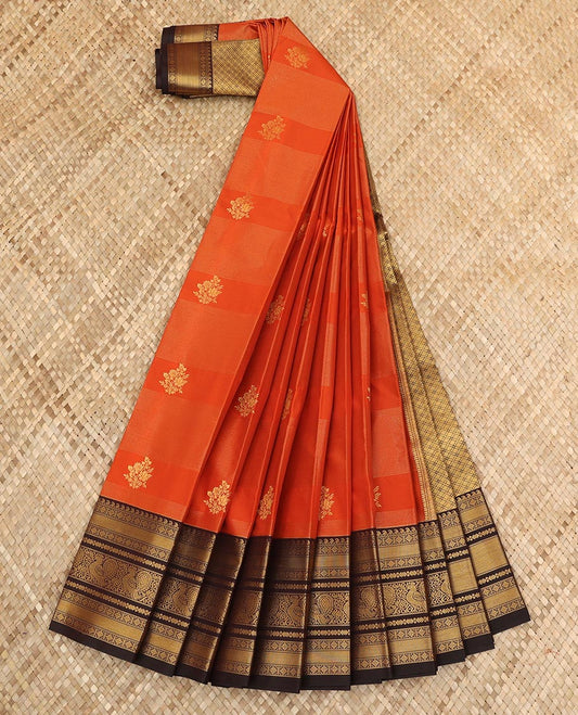 Rust orange floral buttas and striped budget silk saree, contrast traditional zari design border, and jaal pallu