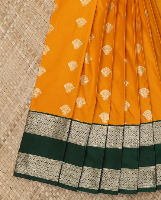 Orange Budget Silk Saree Bedecked with Zari Buttas, Highlighted with a Contrast Temple Traditional Zari Design Border, Rich Pallu of Subtle Jaal Design, and Paired with a Contrast Blouse