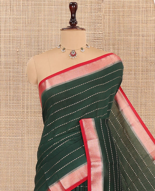 Green Assam Silk Saree, Detailed with Zari Stripes on Its Body, Complemented by a Contrast Zari Chevron Striped Border, Pallu Steeped with Zari Stripes, and Paired with a Contrast Blouse