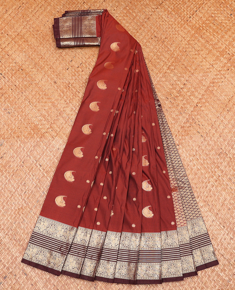 Brown Budget Silk Saree, Artfully Woven with Peacock Buttas All Over Its Body, Complemented by Contrast Traditional Zari Designs Woven Border, Grand Jaal Pallu and Paired with a Contrast Blouse