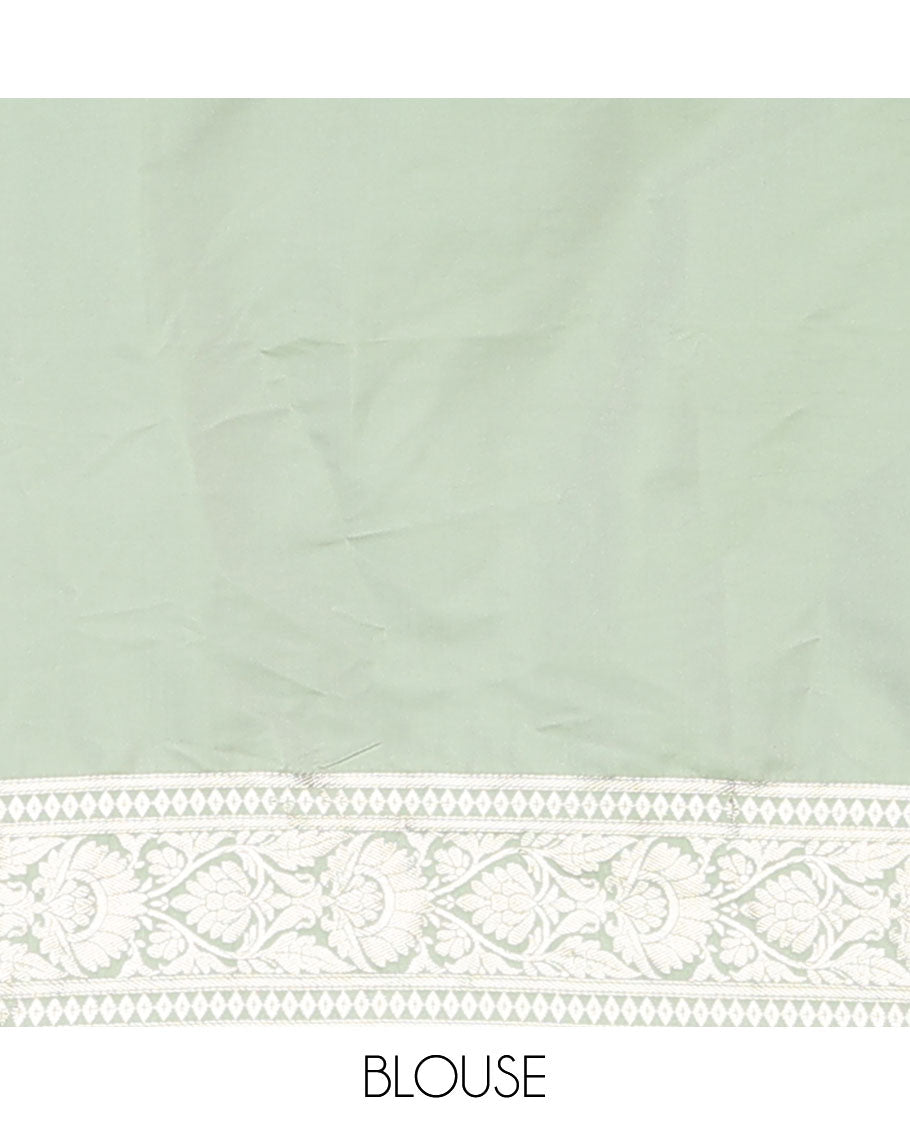 Pistachio green floral jacquard semi banaras satin, self-border & pallu steeped with intricate designs