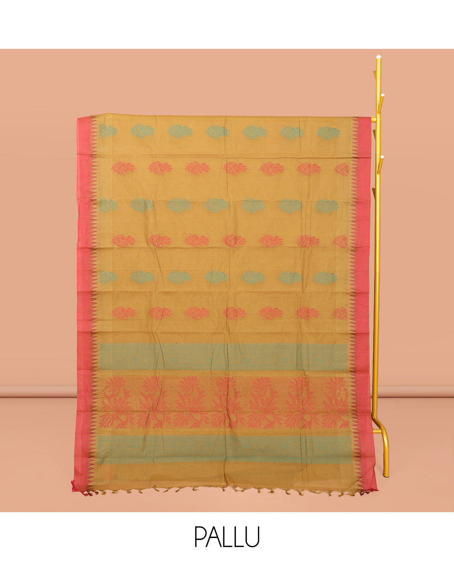 Mustard Kanchi Cotton Saree, Ornamented with Buttas All Over Its Body, Complemented by a Contrast Temple Border, Pallu of Floral Design, and Paired with a Matching Blouse