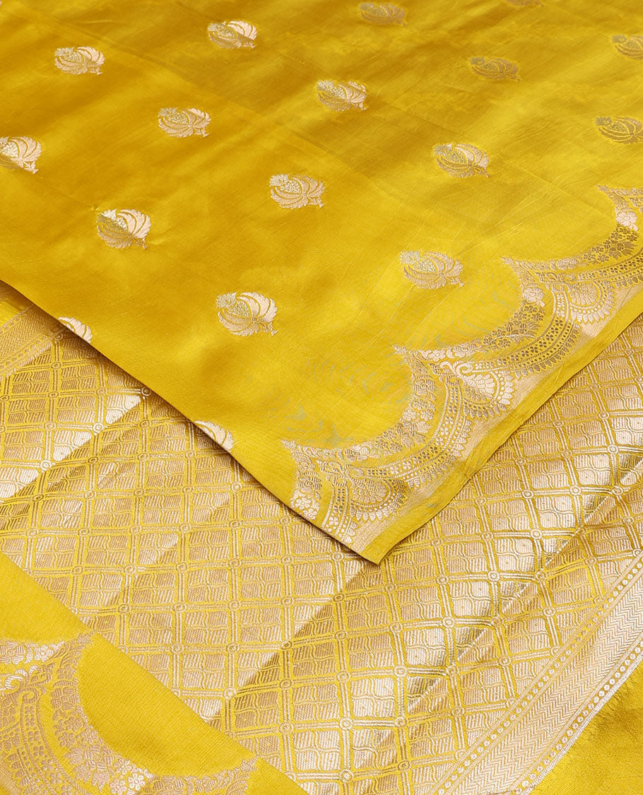 Yellow zari buttas raw mango silk saree, zari border of scallop designs & jaal design pallu