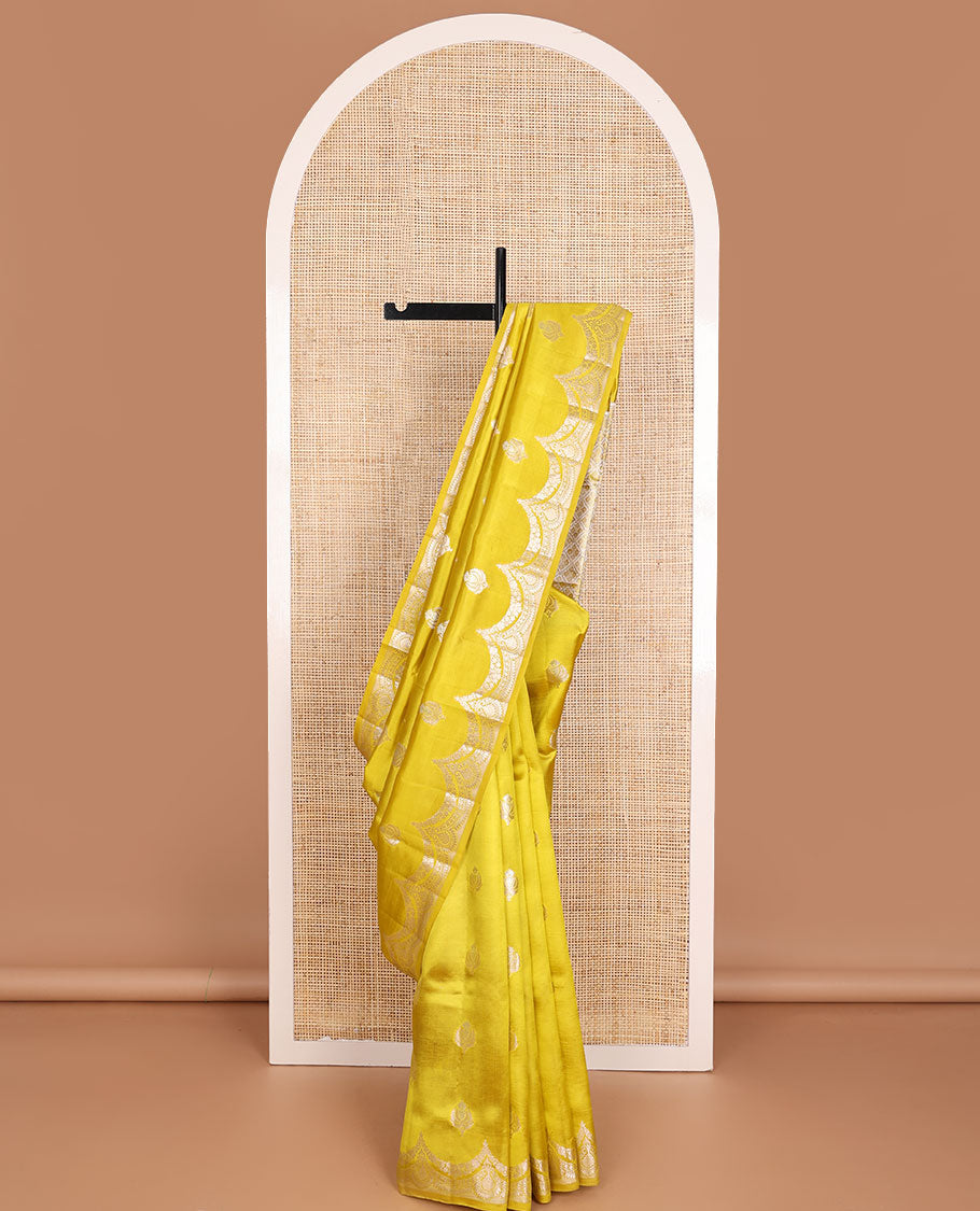 Yellow zari buttas raw mango silk saree, zari border of scallop designs & jaal design pallu