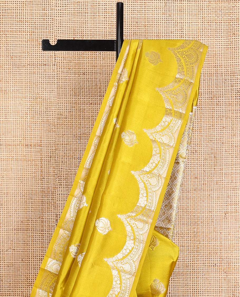 Yellow zari buttas raw mango silk saree, zari border of scallop designs & jaal design pallu