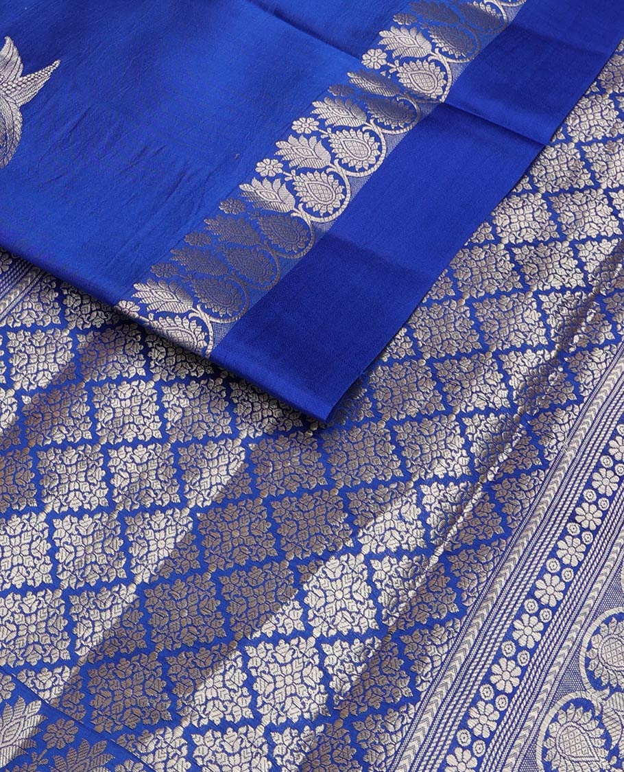 Royal blue zari buttas raw mango silk saree, floral-scallop border, and sliver color zari rich pallu of jaal design