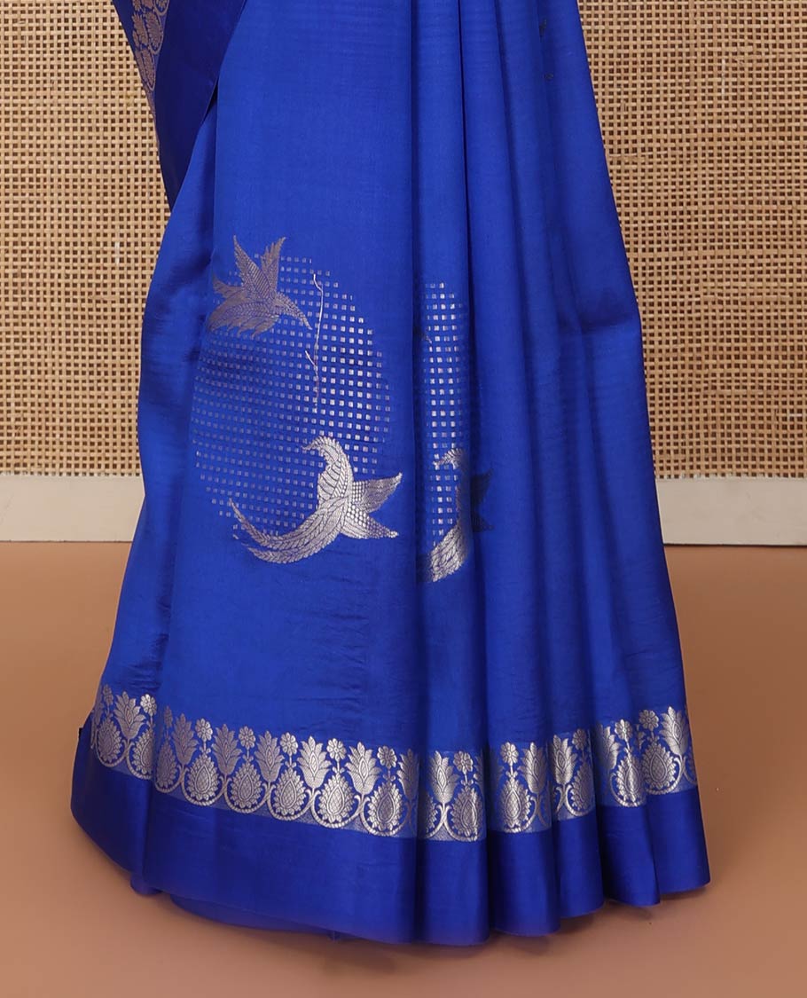 Royal blue zari buttas raw mango silk saree, floral-scallop border, and sliver color zari rich pallu of jaal design