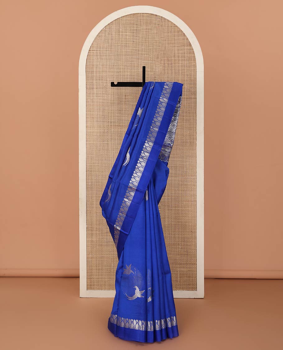 Royal blue zari buttas raw mango silk saree, floral-scallop border, and sliver color zari rich pallu of jaal design