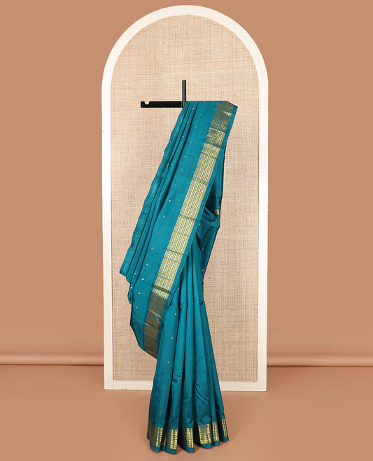 Blue zari buttas Kanchipuram silk saree, zari one-sided border of paneer sombu, banaras, kathir, manga mokku designs, and zari design pallu