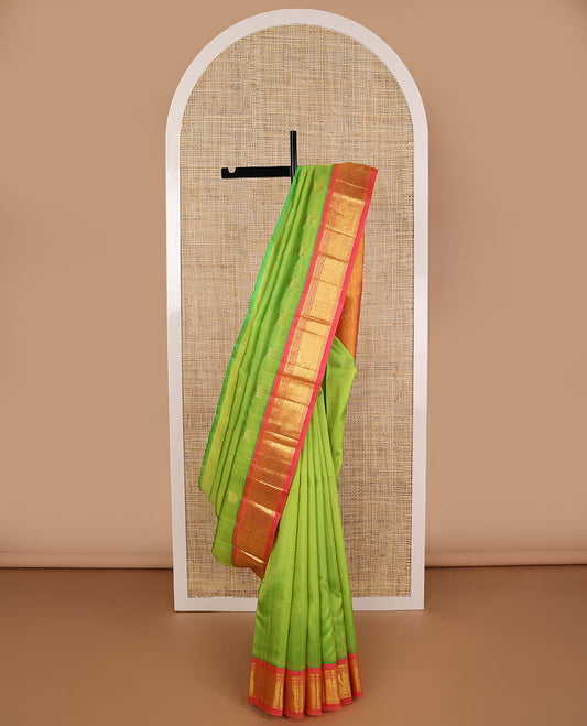 Freen buttas kancheepuram silk saree with contrast border of thilakam mooku, banaras, muthu design & zari design pallu