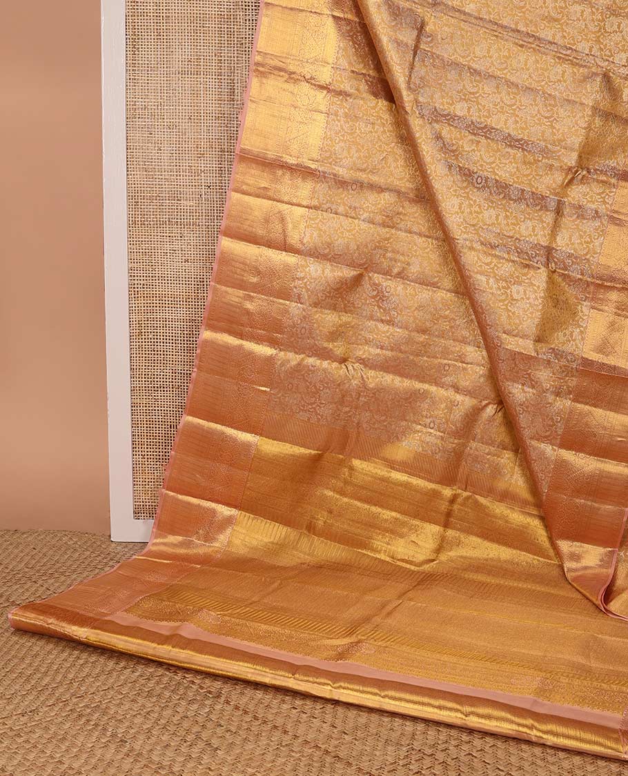Light orange floral jacquard kancheepuram silk saree with contrast zari design & floral design pallu