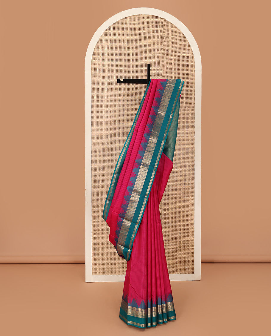 Red vazhaipoo striped Kanchipuram silk saree, contrast thazampoo rekku rettai pettu border of kodi visiry designs, and diagonally woven motifs steeped pallu