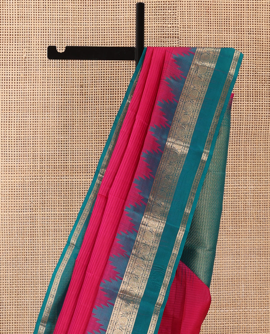 Red vazhaipoo striped Kanchipuram silk saree, contrast thazampoo rekku rettai pettu border of kodi visiry designs, and diagonally woven motifs steeped pallu