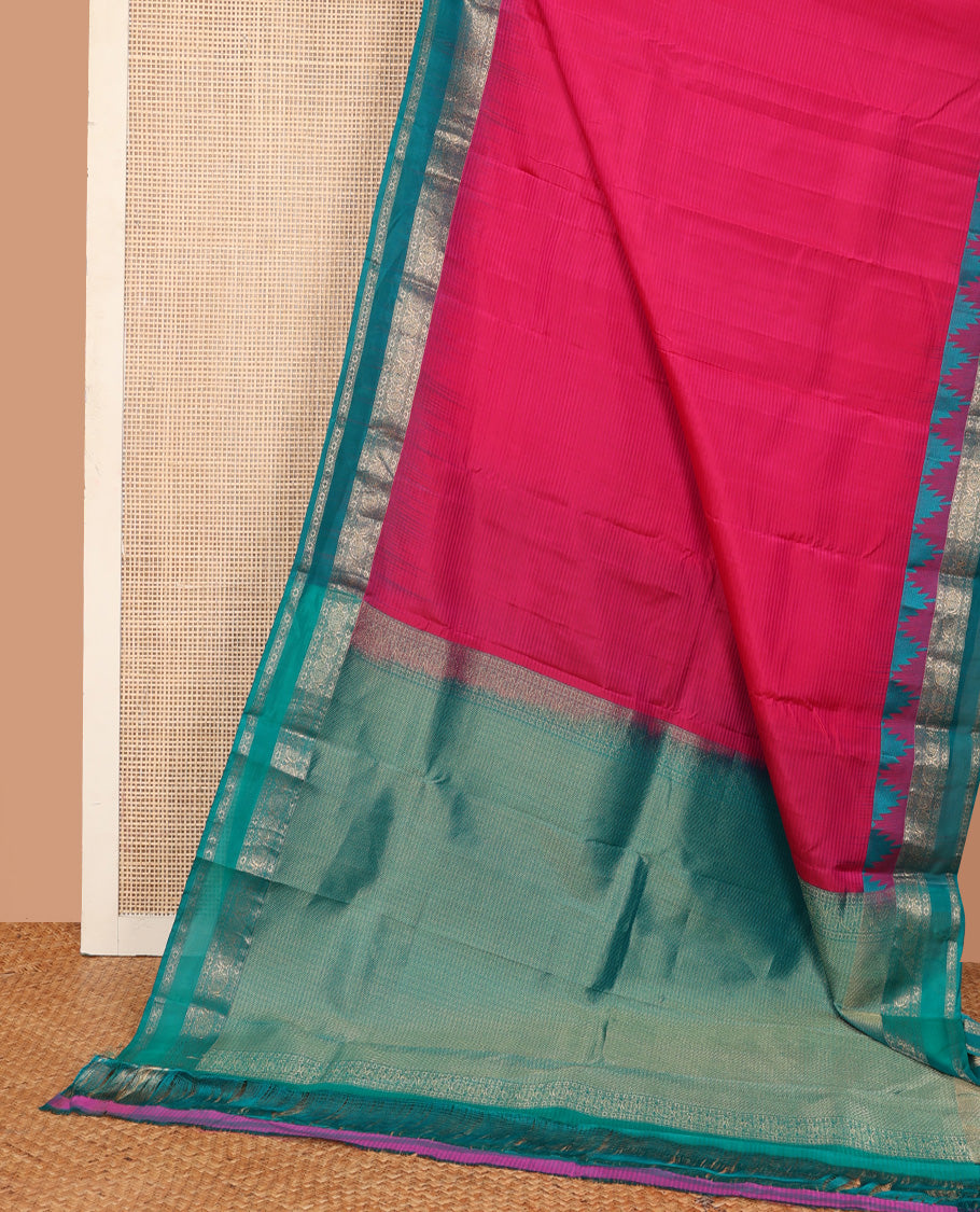 Red vazhaipoo striped Kanchipuram silk saree, contrast thazampoo rekku rettai pettu border of kodi visiry designs, and diagonally woven motifs steeped pallu