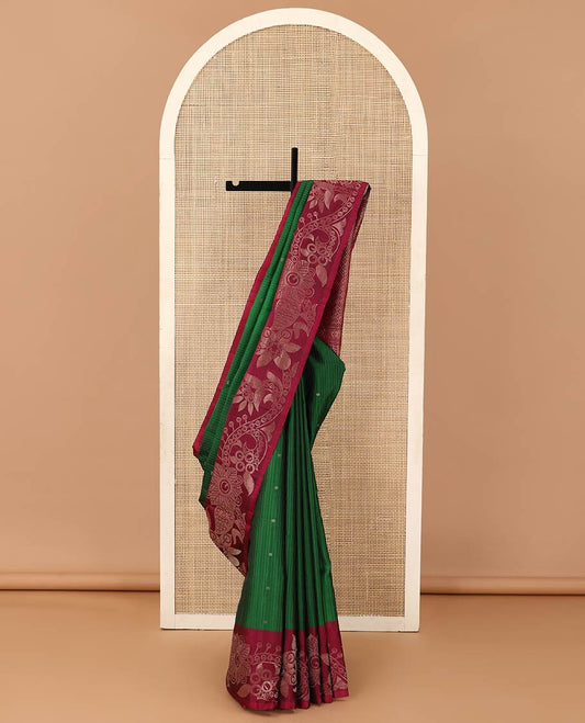 Green stripes and zari buttas soft silk saree, contrast floral design border, and jaal pallu