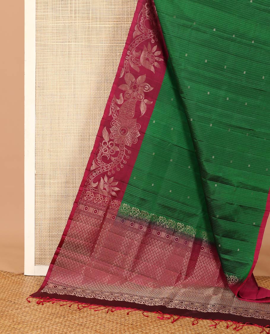 Green stripes and zari buttas soft silk saree, contrast floral design border, and jaal pallu