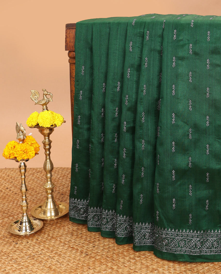 Bottle green butta embroidery matka saree with flower design, zari embroidery border & buuta design pallu alogn with plain blouse