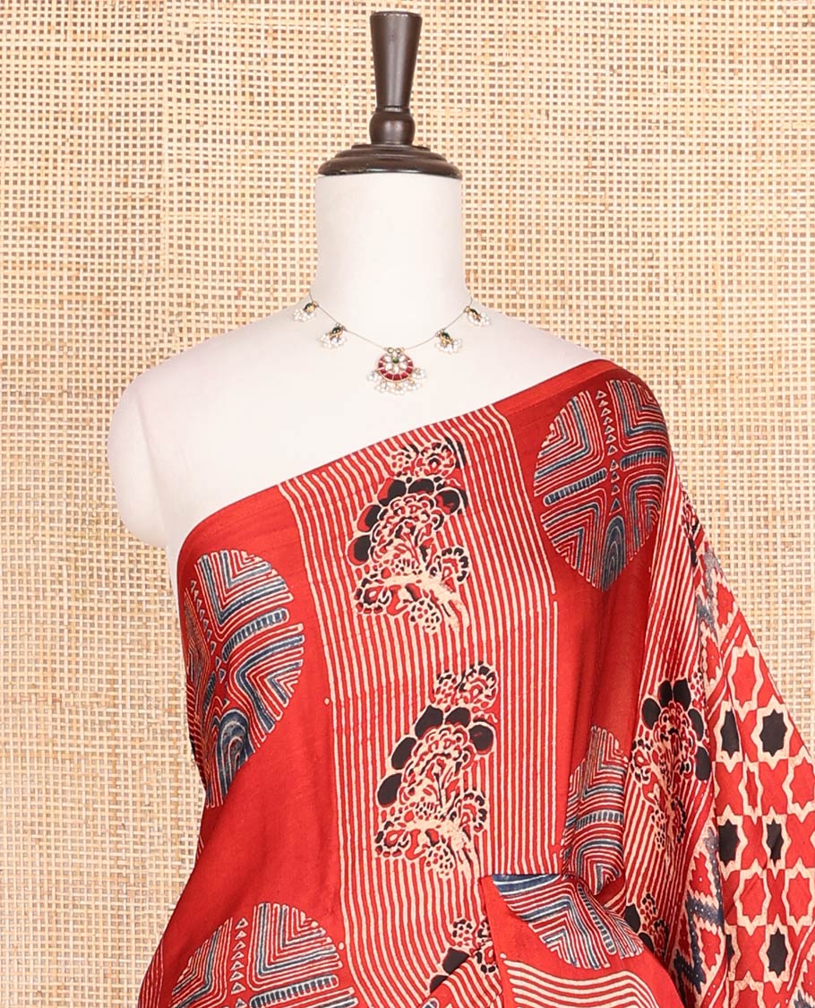 Borderless red geometric design modal saree with geometric design pallu