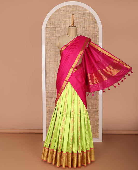 Light green floral design silk half saree with contrast border of banaras, muthu, paun design, zari design blouse & floral design dhavani
