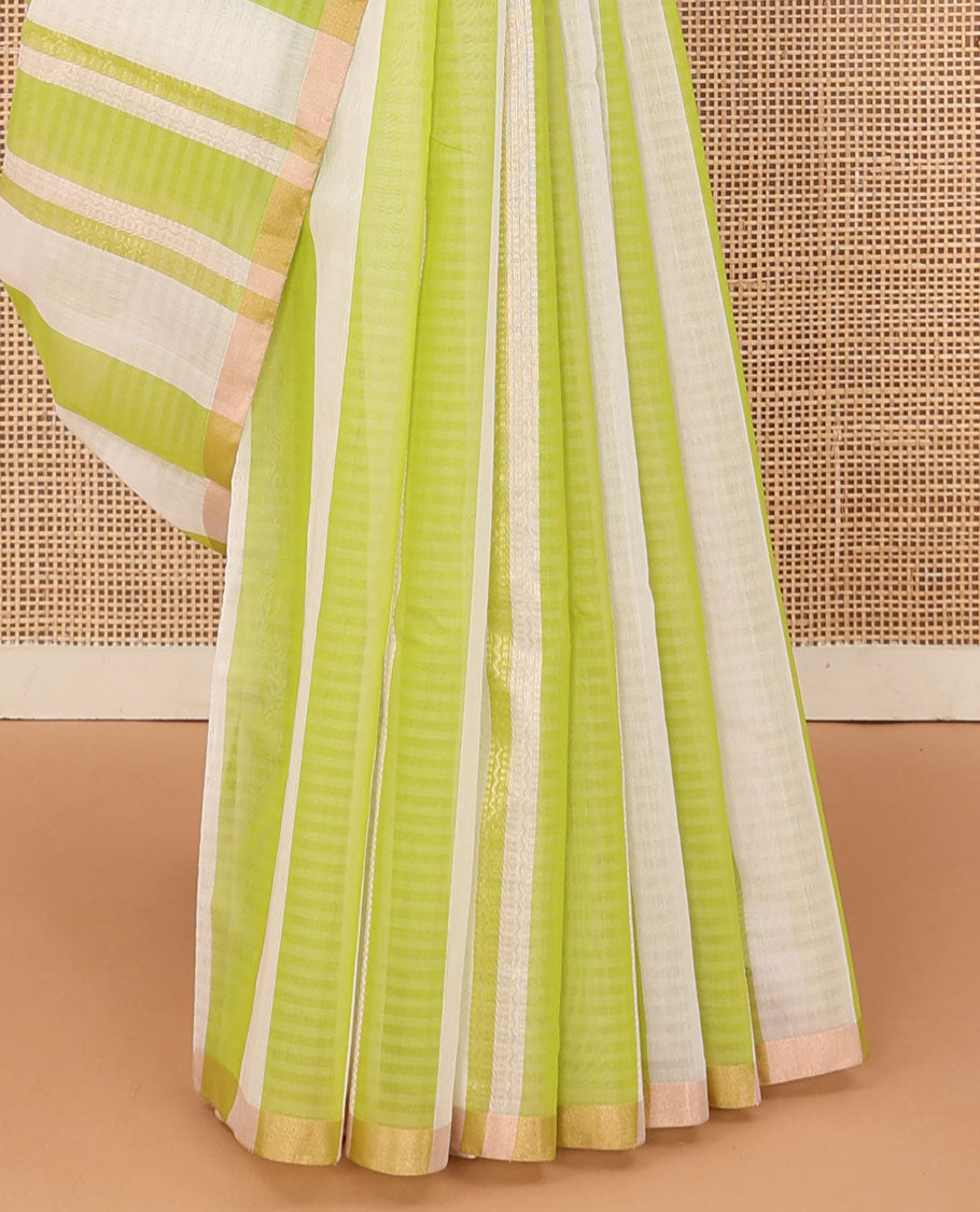 Green striped silk cotton saree, zari piping border, and contrast zari design pallu