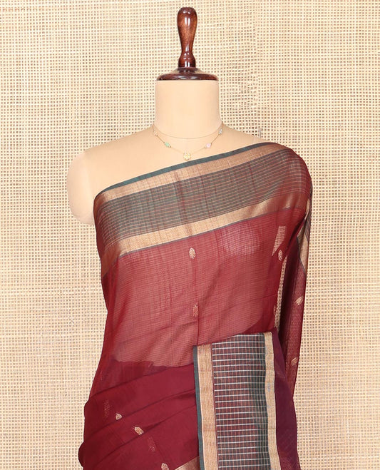 Maroon Silk Cotton Saree, Woven with Zari Buttas, Complemented by a Contrast Checked Border, Intricately Designed Pallu, and a Contrast Blouse
