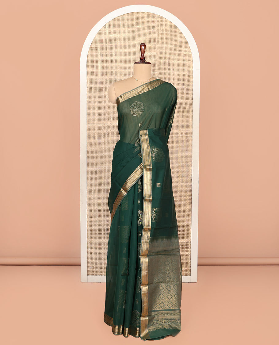 Green Silk Cotton Saree, Embellished with Geometric Buttas All Over Its Body, Highlighted by Traditional Zari Designs Woven Border, Grand Jaal Pallu and Paired with a Matching Blouse