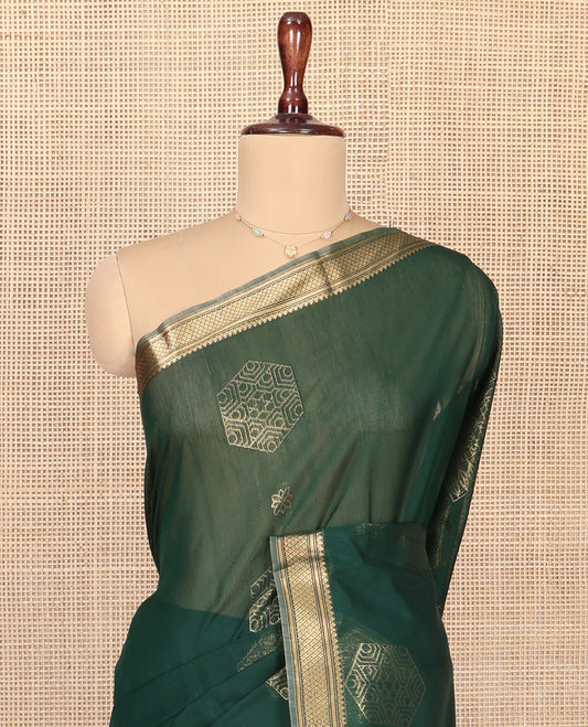 Green Silk Cotton Saree, Embellished with Geometric Buttas All Over Its Body, Highlighted by Traditional Zari Designs Woven Border, Grand Jaal Pallu and Paired with a Matching Blouse