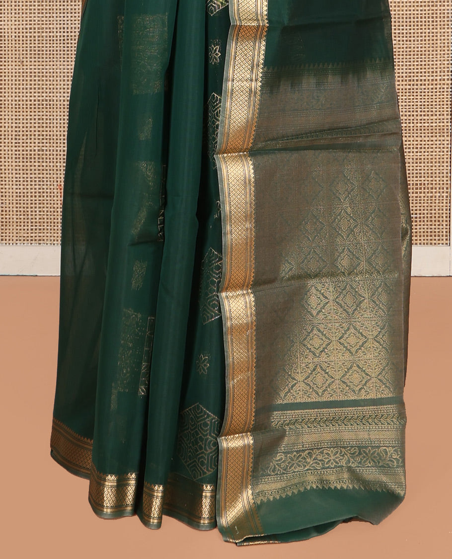 Green Silk Cotton Saree, Embellished with Geometric Buttas All Over Its Body, Highlighted by Traditional Zari Designs Woven Border, Grand Jaal Pallu and Paired with a Matching Blouse