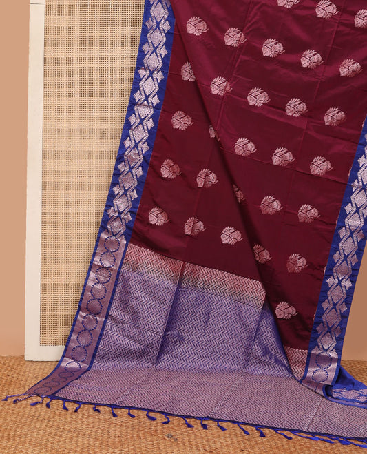 Maroon semi-soft silk saree with zari floral buttas, contrast diamond design zari border & chevron striped pallu