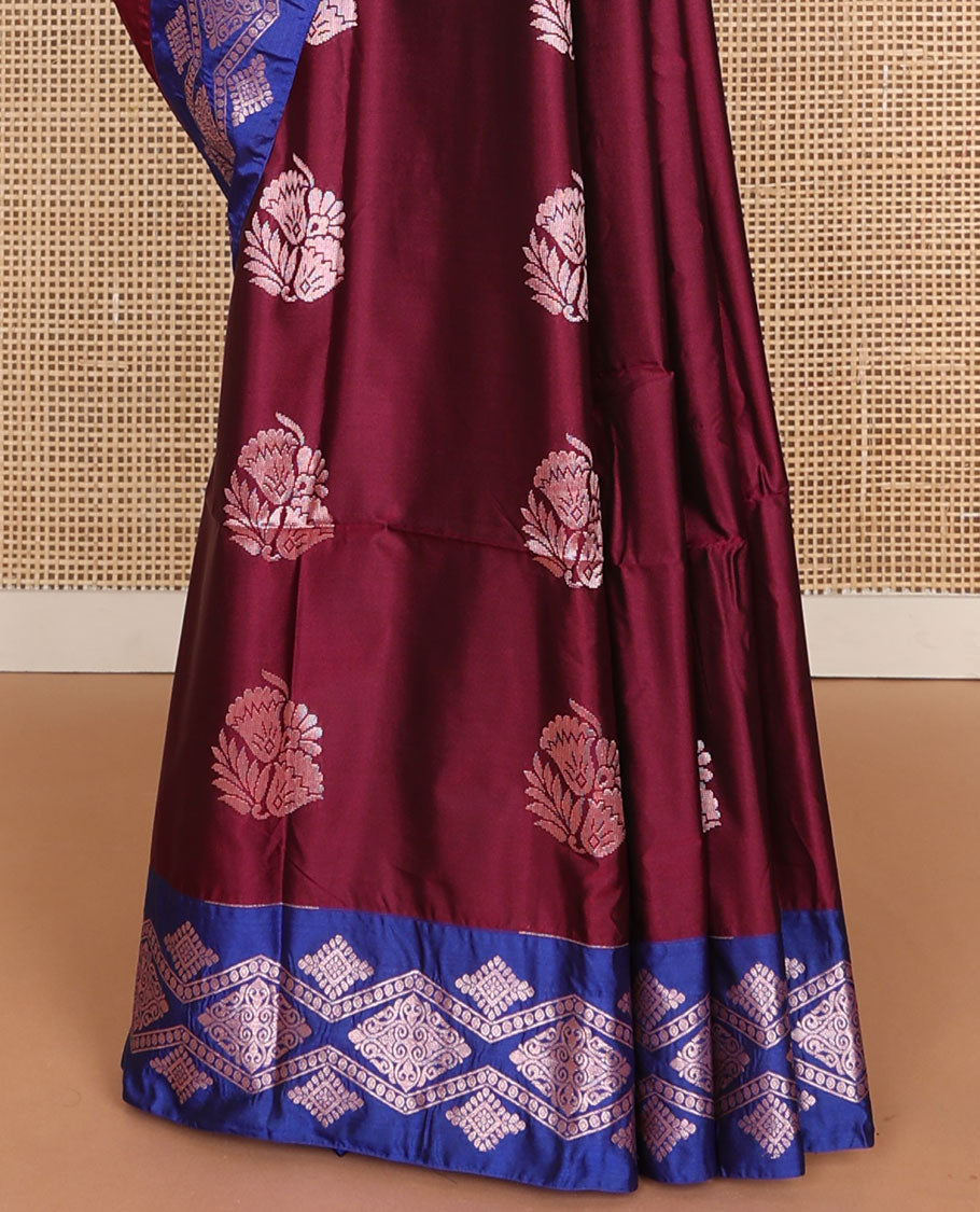 Maroon semi-soft silk saree with zari floral buttas, contrast diamond design zari border & chevron striped pallu