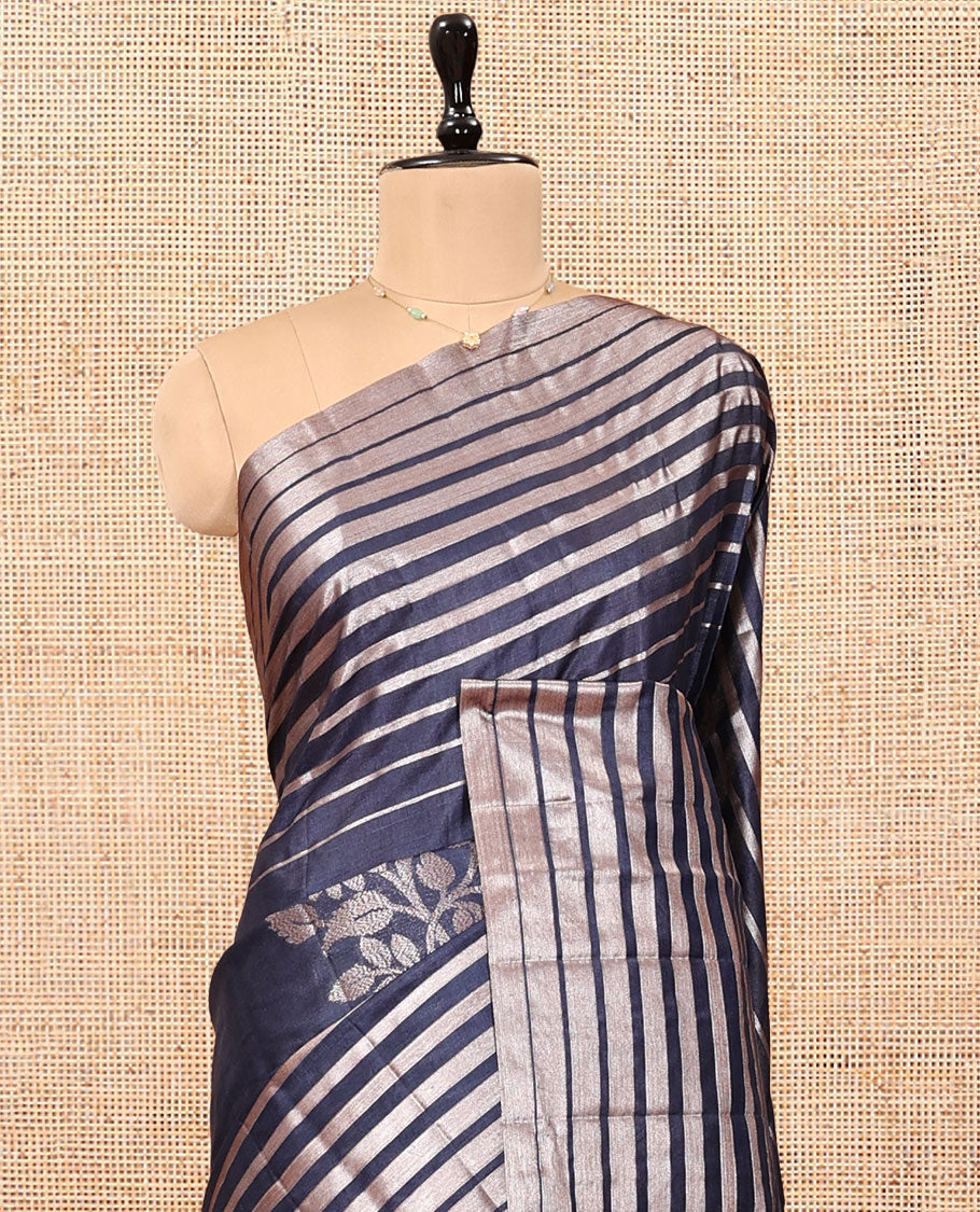 Borderless Blue Tussar Silk Saree, Gracefully Embellished with Zari Stripes and Floral Buttas, Striped Pallu, and a Matching Blouse