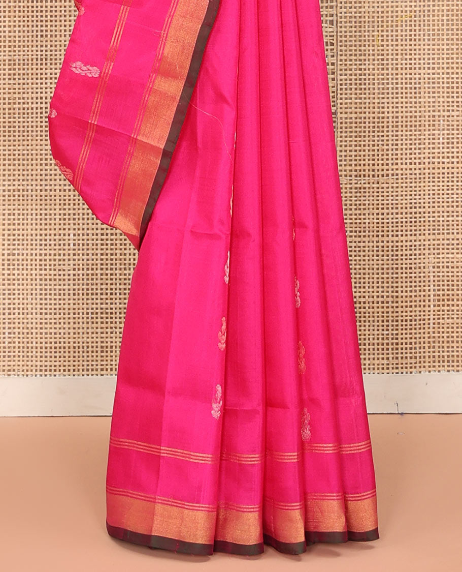 Rani Pink Uppada Silk Saree Elegantly Highlighted with Zari Buttas, Subtle Zari Border, Complemented by a Pallu of Peacock and Paisley Designs, and Paired with a Contrast Blouse