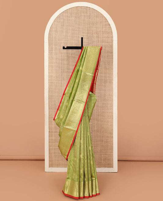 Parrot green buttas enclosed checked Venkatagiri silk saree, floral creeper zari border, and contrast floral creeper, and paisley pallu